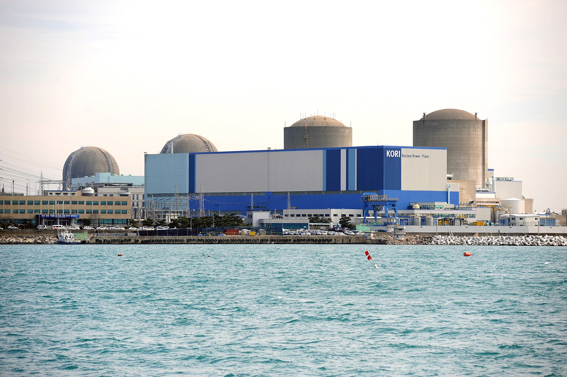 Reactor buildings of the Kori Nuclear Power Plant seen across the sea